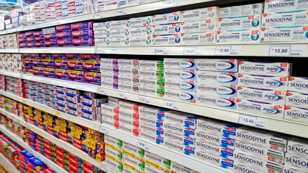 toothpaste-on-shelf-consumer-choices-metrics-stock